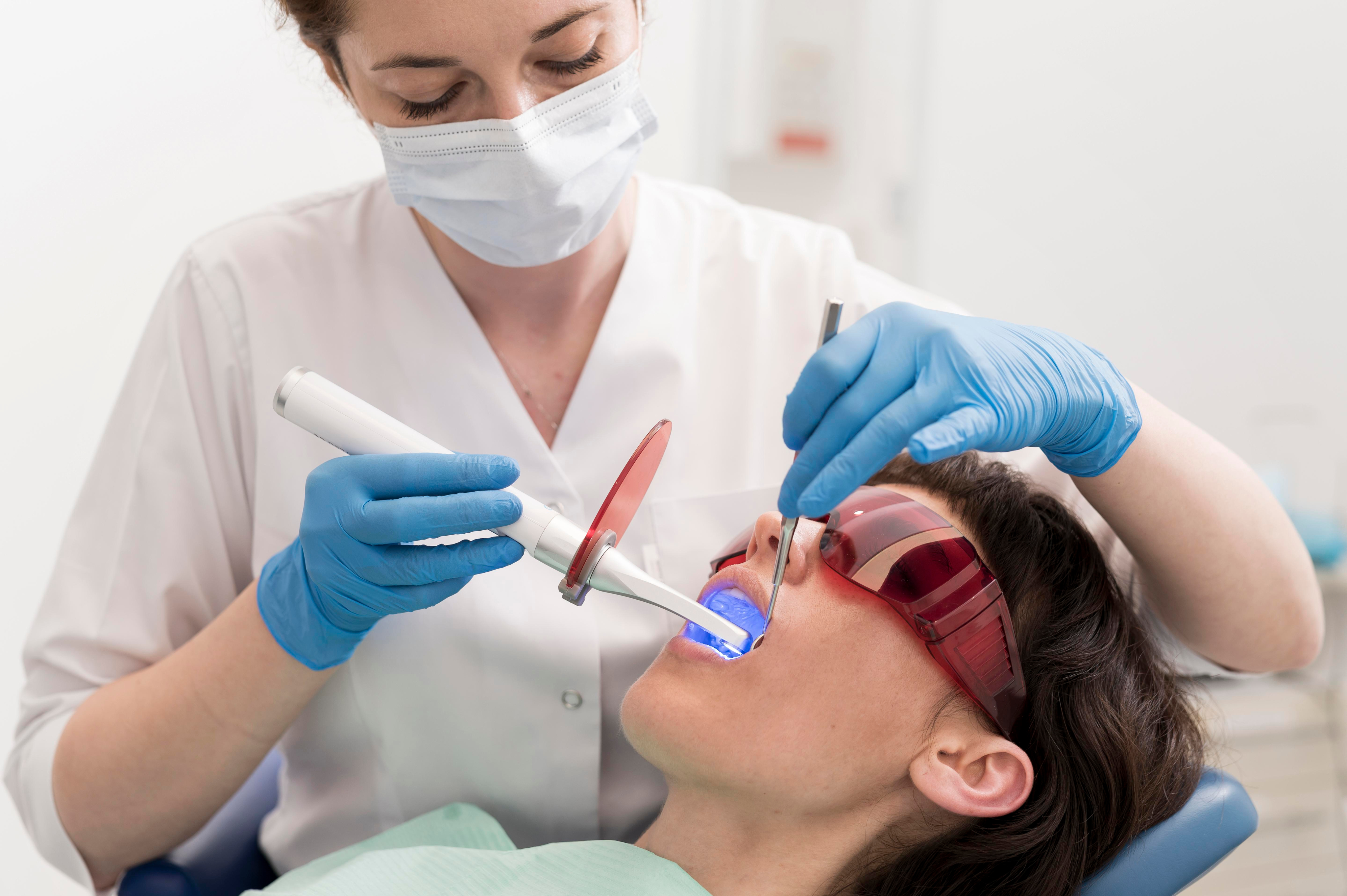 Dentist treating patient